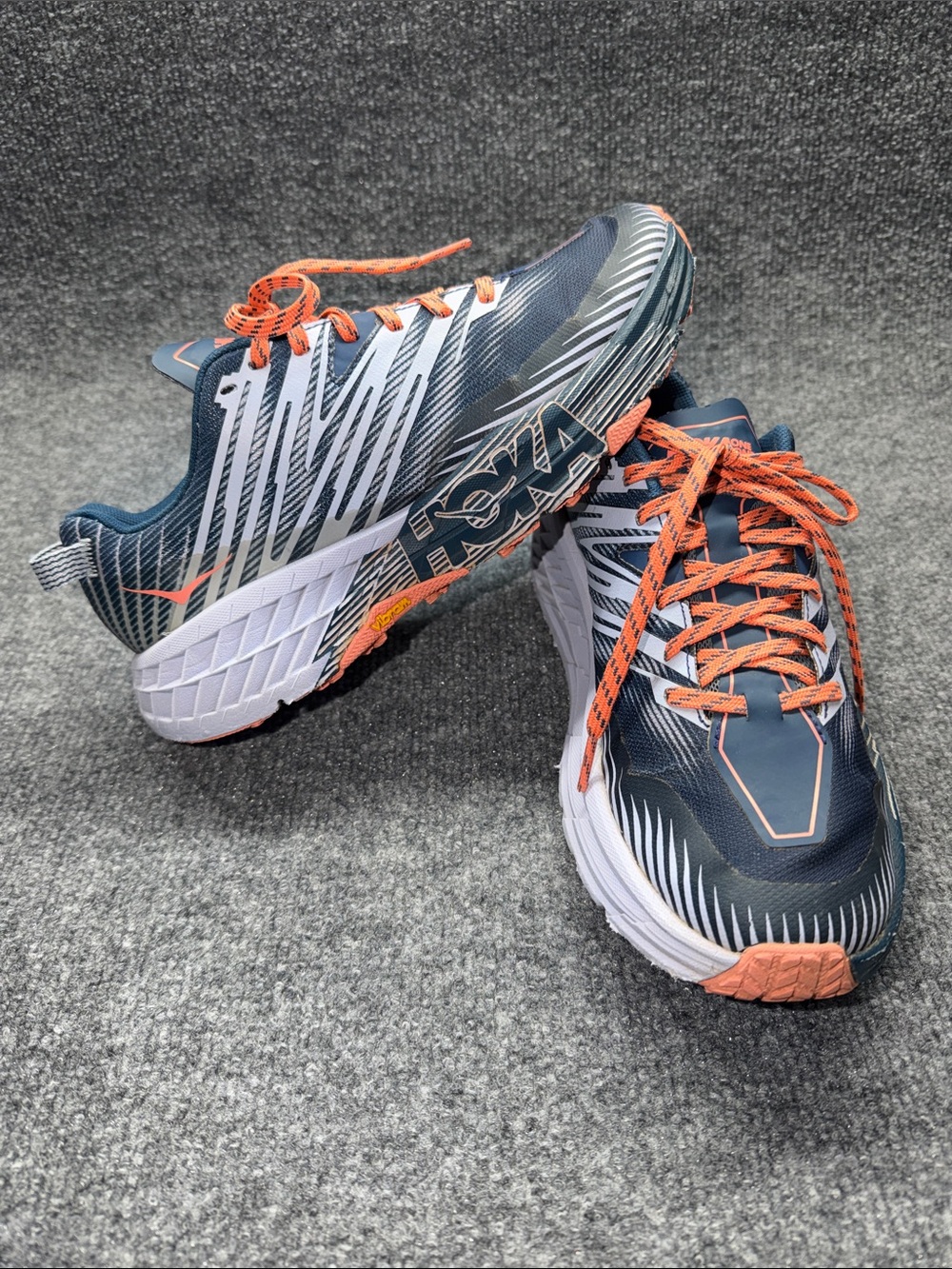 Hoka One One Navy and Orange Speedgoat Trail Sneakers
